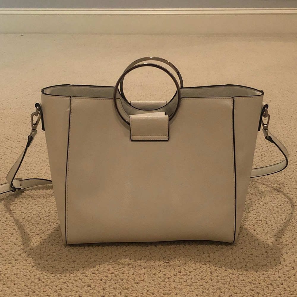 Brand new Carlos Santana white leather purse